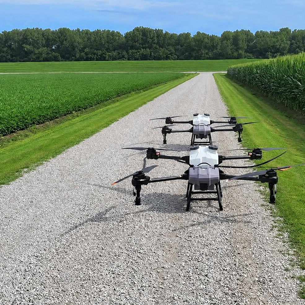 Two Elevon Aerial Ag Z30 drones lined up on a gravel road