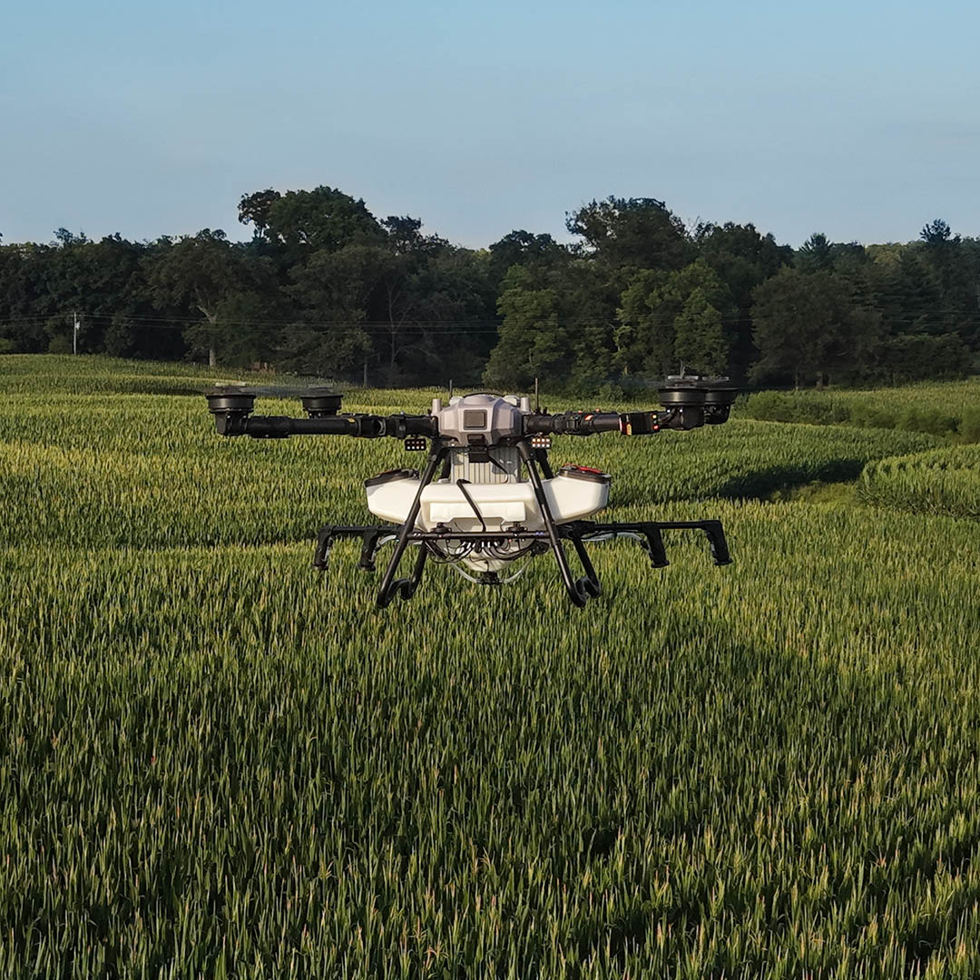 Elevon Aerial Ag Z80 spray drone flying above corn field